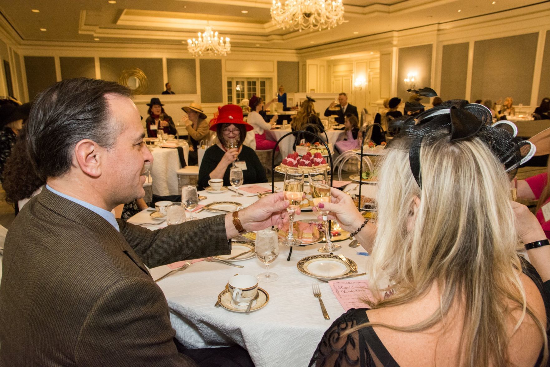 Guests have a toast before tea